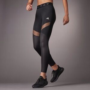Adidas black performance leggings with mesh cut out (XS)